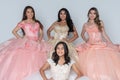 Four Hispanic Girls In Quinceanera Dresses Royalty Free Stock Photo