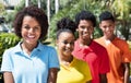 Group of four happy latin american young adult in line Royalty Free Stock Photo