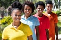 Group of four latin american young adult in line Royalty Free Stock Photo