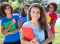 Group of four latin and caucasian female students