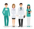 Group of four medical people standing together in uniform and different poses. Doctors and nurses on white background Royalty Free Stock Photo