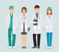 Group of four medical people standing together in uniform. Doctors and nurses in different poses on white background Royalty Free Stock Photo