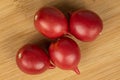 Fresh tomato de barao on light wood Royalty Free Stock Photo