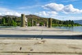 Group four youth sitting on end of pier on Lake Dunstan