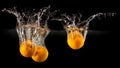 Group of fresh fruits falling in water with splash on black background Royalty Free Stock Photo