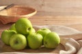 Group of fresh Green Apple on wooden board background. Healthy fruits concept Royalty Free Stock Photo