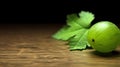 Group of Fresh Green Gooseberry Fruits On Green Background with Copy Space Selective Focus Royalty Free Stock Photo