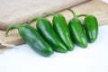 Group of fresh, healthy jalapeno peppers Royalty Free Stock Photo