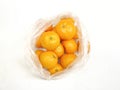 A group of fresh mandarin oranges arranged on a clean white background. Royalty Free Stock Photo