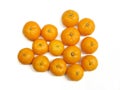 A group of fresh mandarin oranges arranged on a clean white background. Royalty Free Stock Photo