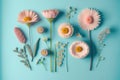 Group fresh pastel colorful flower placing on isolated blue background.