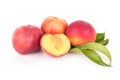 Group of fresh peaches with leaves Royalty Free Stock Photo