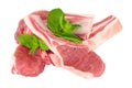 Raw Lamb Cutlets With Mint Leaf Garnish