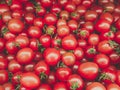 Group of fresh red cherry tomatoes at market Royalty Free Stock Photo