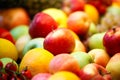 Group of fresh red green apples  orange at the supermarket. Fresh fruit background Royalty Free Stock Photo