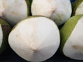 Group of fresh tropical sweet green coconut fruits ready to serve as beverage , popular refreshing sweet drinks Royalty Free Stock Photo