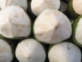 Group of fresh tropical sweet green coconut fruits ready to serve as beverage , popular refreshing sweet drinks Royalty Free Stock Photo