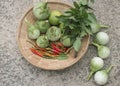 A group of fresh vegetables in a basket. chilli peppers, green e Royalty Free Stock Photo
