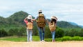 Group friend children travel nature summer trips.  Family Asia people tourism walking on road Royalty Free Stock Photo