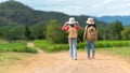 Group friend children travel nature summer trips. Family Asia people tourism walking on road happy and fun explore adventure Royalty Free Stock Photo