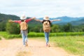 Group friend children travel nature summer trips.  Family Asia people tourism walking on road happy and fun explore adventure outd Royalty Free Stock Photo