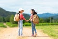 Group friend children travel nature summer trips. Family Asia people tourism walking on road happy Royalty Free Stock Photo