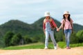 Group friend children travel nature summer trips. Family Asia people tourism walking on road happy Royalty Free Stock Photo