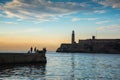 Group of friend fishing at Malecon, in Havana, Cuba.