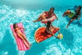 Group of friend play together in the swimming pool Royalty Free Stock Photo