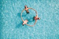 Group of friend play together in a swimming pool Royalty Free Stock Photo