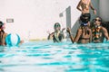 Group of friend play together in the swimming pool Royalty Free Stock Photo