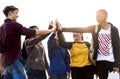 Group of friends all high five together support and teamwork concept Royalty Free Stock Photo