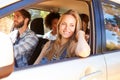 Group Of Friends In Car On Road Trip Together Royalty Free Stock Photo