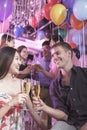 Group of friends celebrating, toasting with champagne, nightclub in Beijing Royalty Free Stock Photo
