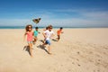 Group of friends children run with colorful kite Royalty Free Stock Photo