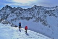 A group of friends is climbing to the summit of Koprovsky Stit.