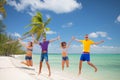 Group of friends or couples jumping on the beach Royalty Free Stock Photo