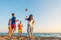 Group of friends enjoy on the beach