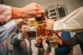 Group of friends enjoying evening drinks with beer Royalty Free Stock Photo