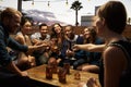 Group Of Friends Enjoying Night Out At Rooftop Bar Royalty Free Stock Photo