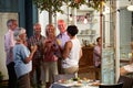 Group Of Friends Enjoying Outdoor Evening Drinks Party