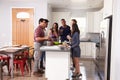 Group Of Friends Enjoying Pre Dinner Drinks At Home Royalty Free Stock Photo