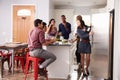 Group Of Friends Enjoying Pre Dinner Drinks At Home Royalty Free Stock Photo