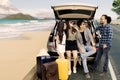 Group of friends enjoying trip near the beach Royalty Free Stock Photo