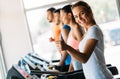 Group of friends exercising on treadmill machine Royalty Free Stock Photo