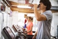 Group of friends exercising on treadmill machine Royalty Free Stock Photo