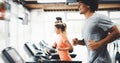 Group of friends exercising on treadmill machine Royalty Free Stock Photo