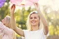 Group of friends floating chinese lanterns Royalty Free Stock Photo