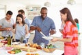 Group Of Friends Having Dinner Party At Home