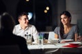 Group of friends having a dinner in a restaurant.Double date.Attractive people night out,dining in a hotel.Trendy people Royalty Free Stock Photo